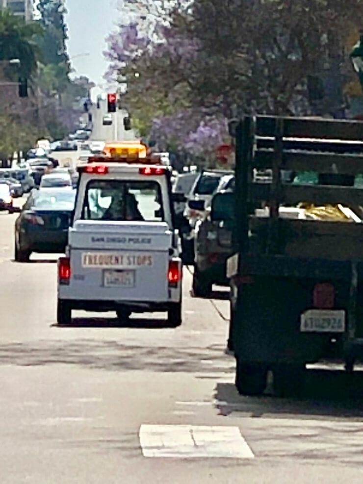 parking ticket downtown san diego meter maid checking parked cars