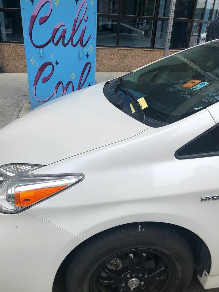 parking ticket car parked downtown san diego with parking ticket on windshield